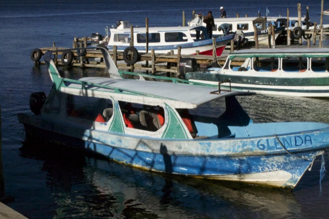 A boat with roof and four seats named Glenda