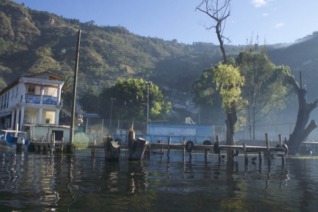 Our approach to Santa Catarina, with a haze of smoke fire over the water
