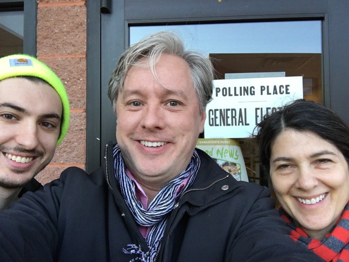 Max Seiler, Michael Janairo, Deborah Zlotsky post outside voting site in Delmar, New York