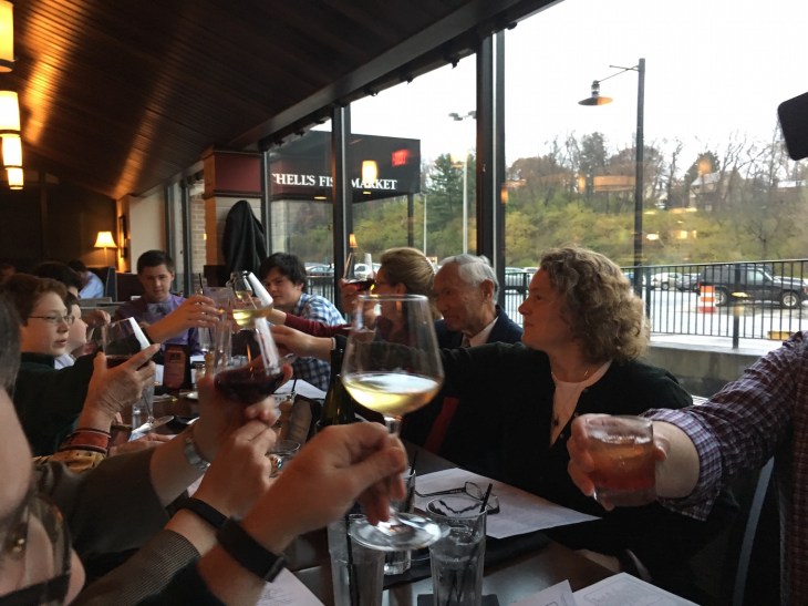 Glasses raised in a toast with Janairo family at Mitchell's Fish Market at the Galleria in Mount Lebanon, Pennsylvania